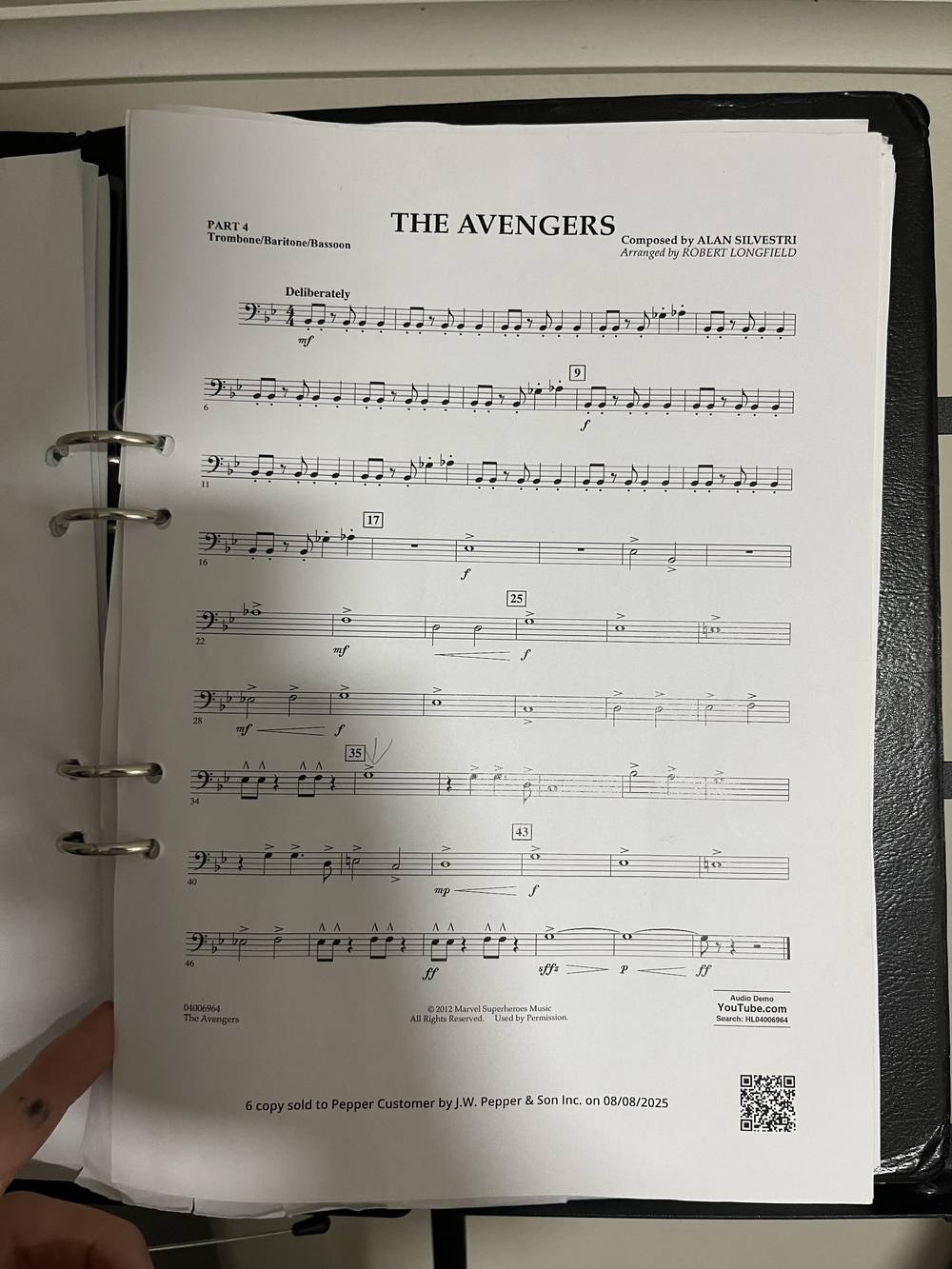 The Avengers, Part 4 trombone part, in a black ring binder